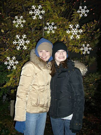 Lana Hiott, left, and her sister Shannon at a winter gathering. Shannon Hiott died Aug. 29 after being stabbed to death in her home. Police have charged her ex-boyfriend with her murder.