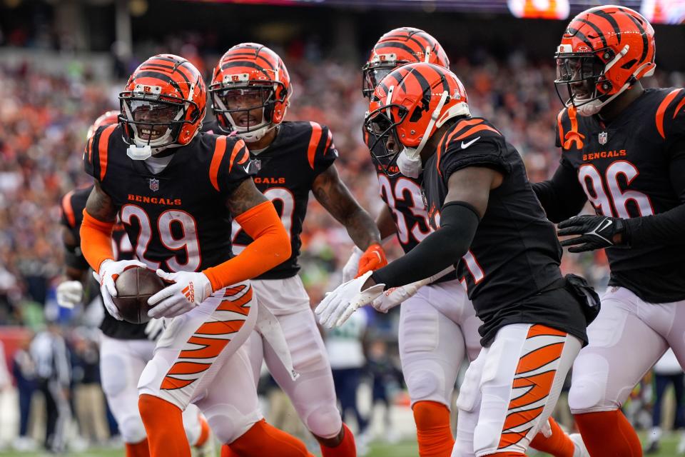 Cincinnati Bengals cornerback Cam Taylor-Britt (29) celebrates an interception in the fourth quarter of the NFL Week 6 game between the Cincinnati Bengals and the Seattle Seahawks at Paycor Stadium in downtown Cincinnati on Sunday, Oct. 15, 2023. The Bengals improved to 3-3 on the season with a 17-13 at home.