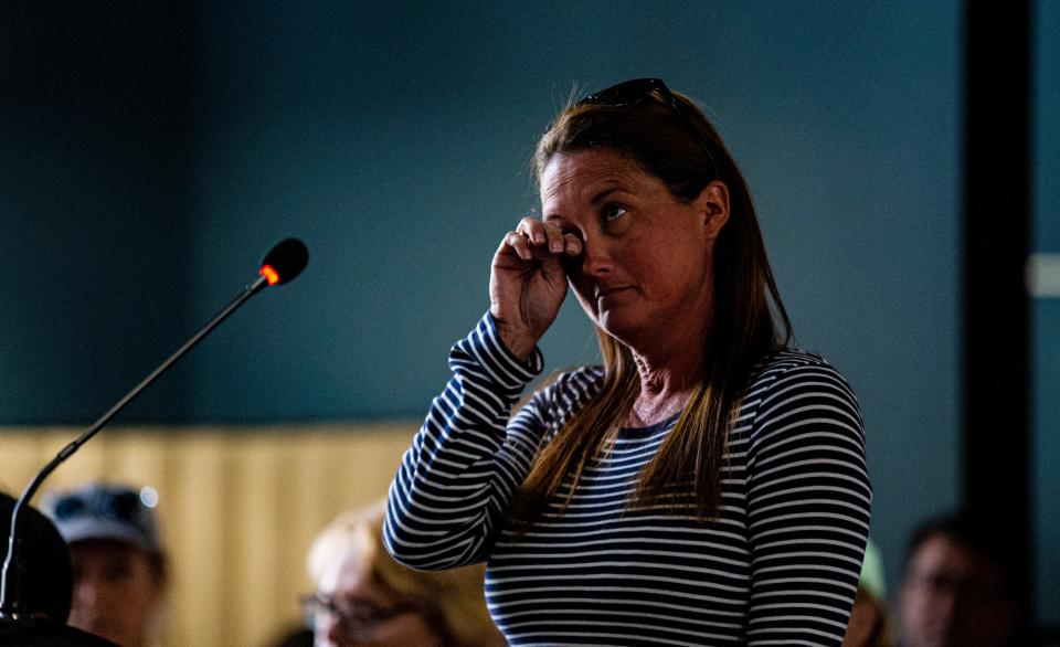 Christy Cory, the utilities manager for the town of Fort Myers Beach answers questions from the town council during a meeting at the old Skip One building on San Carlos Boulevard. It was first town council meeting since Hurricane Ian made landfall. It was an emotionally charged meeting with some residents showing frustration about the response.  