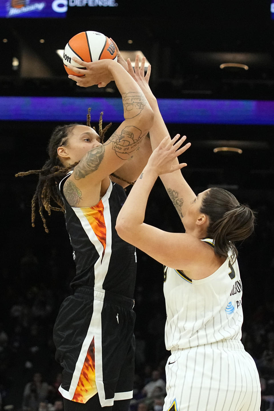 Phoenix Mercury center Brittney Griner (42) shoots over Chicago Sky center Stefanie Dolson during the first half of Game 2 of basketball's WNBA Finals, Wednesday, Oct. 13, 2021, in Phoenix. (AP Photo/Rick Scuteri)