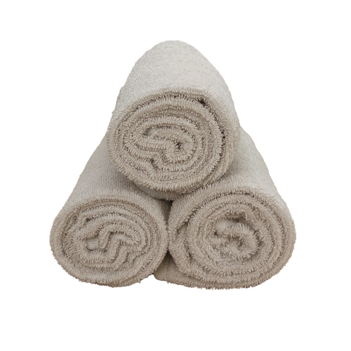 3 folded jungmaven bath towel against white background