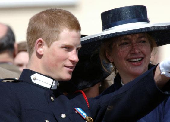 Prince Harry talks to his former nanny, Tiggy Pettifer (formerly Tiggy Legge-Bourke) during his passing-out Sovereign’s Parade at Sandhurst Military Academy on 12 April 2006 (Getty Images)
