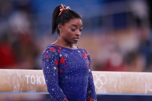 Simone Biles can end her nightmare of an Olympics on a better note in the women's balance beam final. (Jamie Squire/Getty Images - image credit)