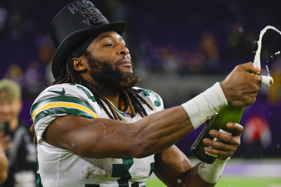 Green Bay Packers' Aaron Jones celebrates after an NFL football game against the Minnesota Vikings Sunday, Dec. 31, 2023, in Minneapolis. The Packers won 33-10. (AP Photo/Bruce Kluckhohn)