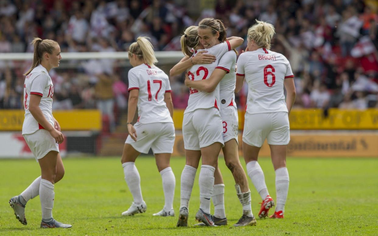 Jill Scott hugs Beth Mead during England's World Cup warm-up win over Denmark - Action Plus