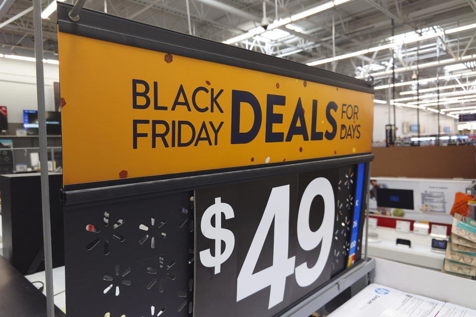 A "Black Friday" sign is posted at a retail location in Philadelphia, Monday, Nov. 21, 2022. Bargain hunting is back with full force heading into the holidays. But inflation is limiting how much of a deal consumers will be getting. (AP Photo/Matt Rourke)