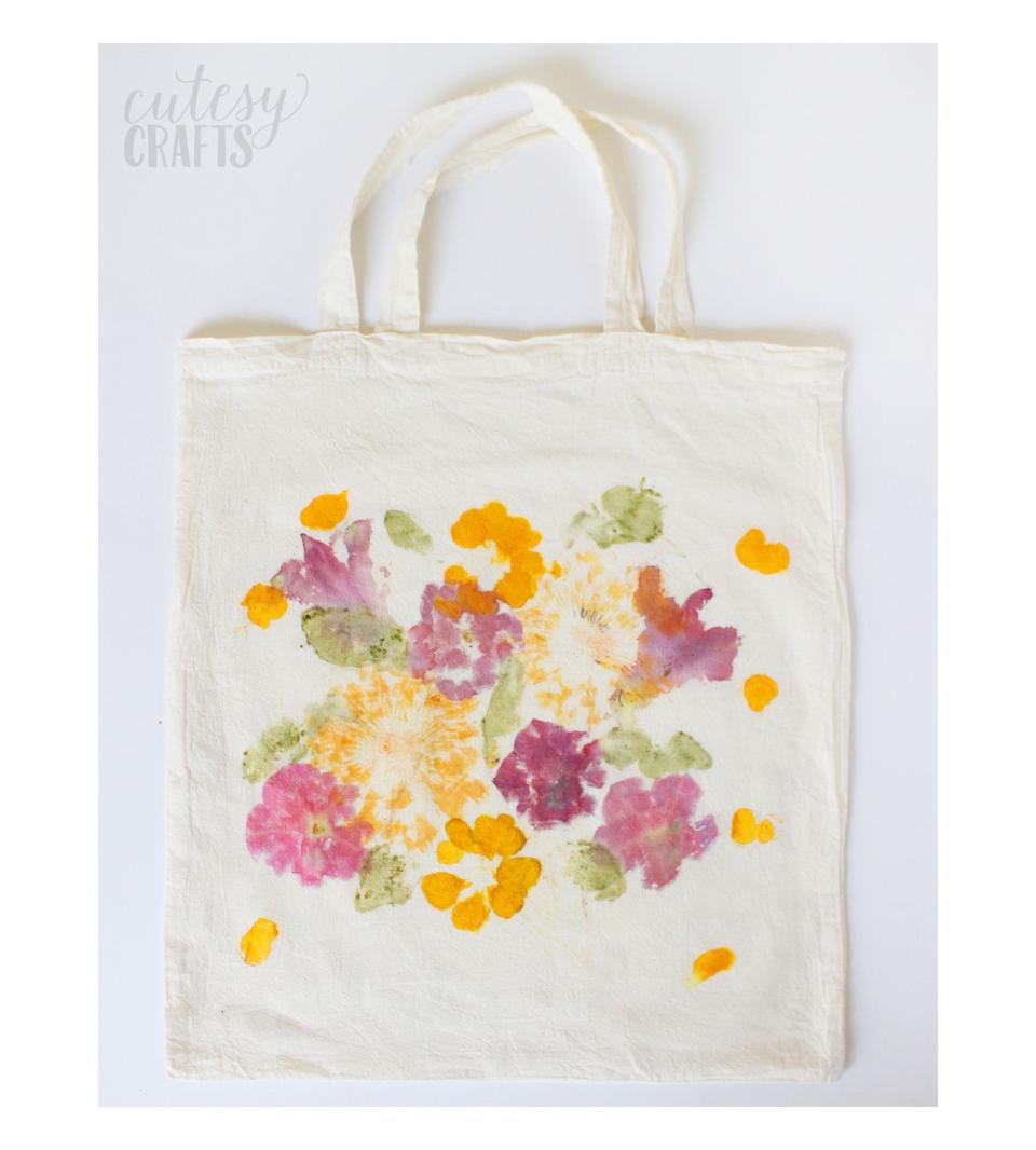 <p>Grab a few colorful flowers from the garden and get hammering to create this nature-inspired tote. Your artistic efforts will shine through and she'll think it's the best Mother's Day gift ever.</p><p><em><a href="https://diycandy.com/mothers-day-gift-pounded-flower-tote/" rel="nofollow noopener" target="_blank" data-ylk="slk:Get the tutorial at Cutesy Crafts »;elm:context_link;itc:0;sec:content-canvas" class="link ">Get the tutorial at Cutesy Crafts »</a></em> </p>