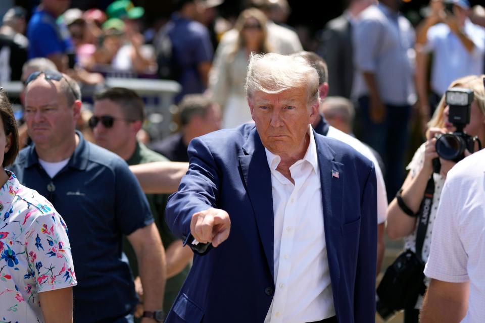 Republican presidential candidate former President Donald Trump visits the Iowa State Fair, Saturday, Aug. 12, 2023, in Des Moines, Iowa. (AP Photo/Charlie Neibergall)
