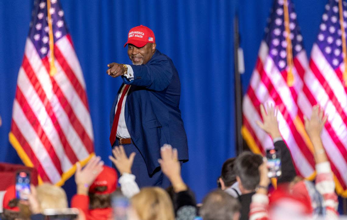Lt. Gov. Mark Robinson, a Republican candidate for governor, acknowledges the crowd at the Trump campaign rally in Greensboro on Saturday, March 2, 2024. Donald Trump endorsed Robinson at the event.