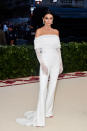 <p>Jenner embodied bride goals in an all-white jumpsuit by Off-White. (Photo: Getty Images) </p>