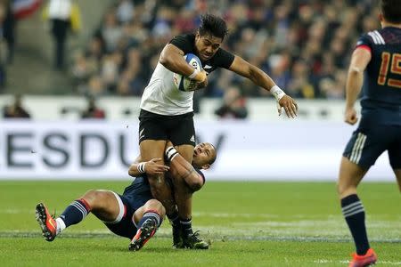 France Rugby - France v New Zealand All Blacks - Stade de France, Saint-Denis near Paris, France, 26/11/2016. France's Gael Fickou and New Zealand's Julian Savea (top) in action. REUTERS/Benoit Tessier