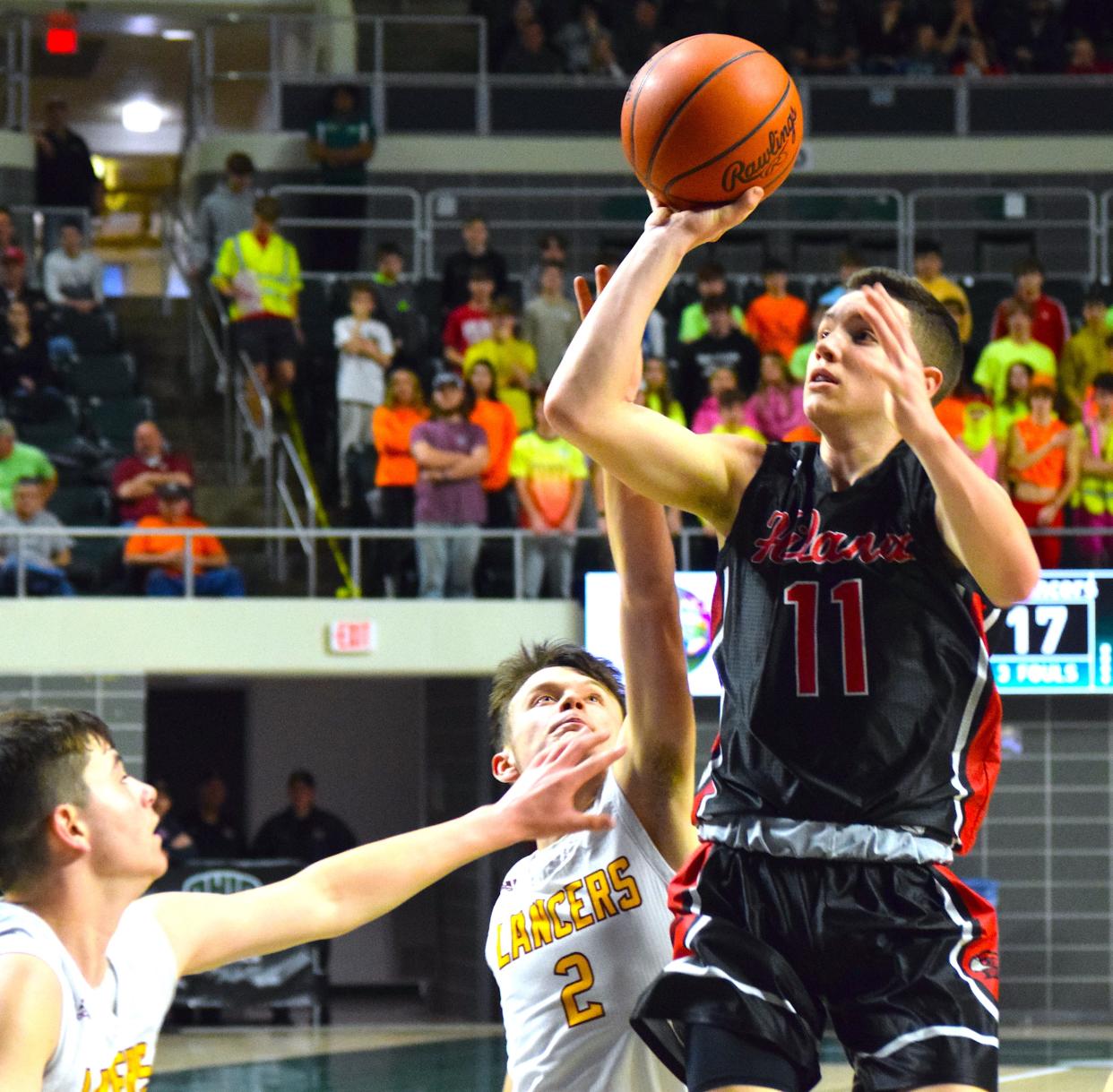 Sammy Detweiler shoots for two of his team-high 16 points to help the Hawks advance to Friday's Div.  IV Athens Regional final.