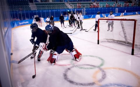 Members of Unified Korea's Women's ice hockey team practice at the Kwandong Hockey Centre before the Pyeongchang 2018 Winter Olympic Games - Credit: AFP/Getty Images