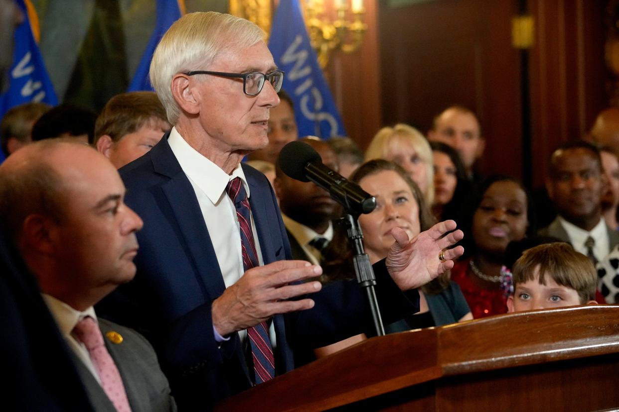 Gov. Tony Evers speaks at a press conference before signing the biennial budget in July. On Friday, he vetoed a bill that would have created a revolving loan program for child care providers for renovations.