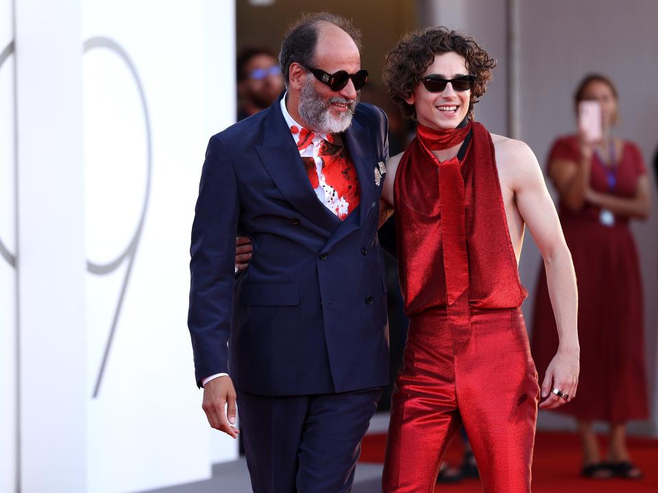 Luca Guadagnino and Chalamet at the "Bones And All" red carpet.