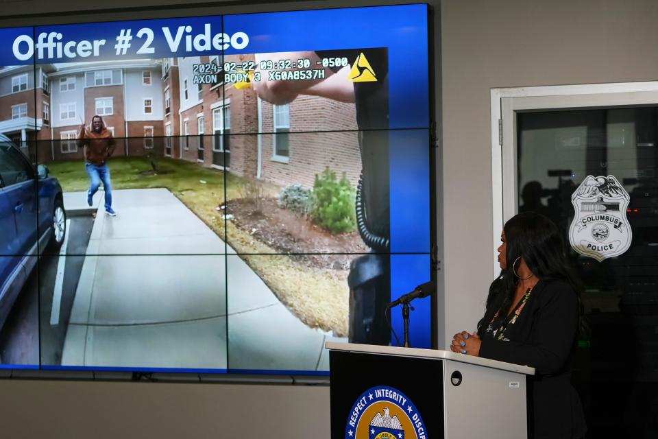 Feb 26, 2024; Columbus, Ohio, USA; Columbus Police 1st Assistant Chief LaShanna Potts shows the body camera footage from the fatal police shooting of 26-year-old Colin Jennings, pictured carrying a knife on the screen behind.