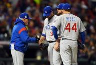 Oct 25, 2016; Cleveland, OH, USA; Chicago Cubs starting pitcher Jon Lester (34) is relieved by manager Joe Maddon in the 6th inning against the Cleveland Indians in game one of the 2016 World Series at Progressive Field. Mandatory Credit: Tommy Gilligan-USA TODAY Sports