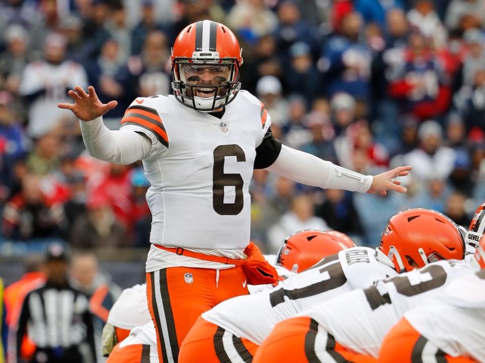 Baker Mayfield makes an adjustment at the line of scrimmage against the New England Patriots.