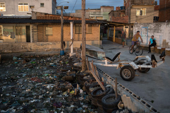 <p>Houses stand next to the heavily polluted shore of Guanabara Bay in Rio de Janeiro, Brazil, Saturday, July 30, 2016. Just days ahead of the Olympic Games the waterways of Rio are as filthy as ever, contaminated with raw human sewage teeming with dangerous viruses and bacteria, according to a 16-month-long study commissioned by The Associated Press. (AP Photo/Felipe Dana)