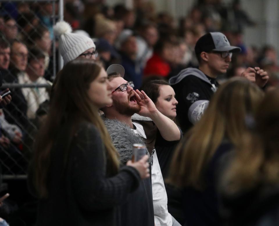 Kenneth Smith of Seaford (center) cheers the Thunder (and heckles the opposition and refs) during a 2020 Delaware Thunder' game at the Centre Ice Arena in Harrington.