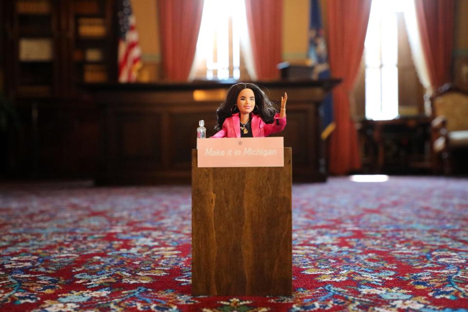 A Barbie version of Gov. Gretchen Whitmer is making the rounds around the Capitol, like this one where she is giving a speech.