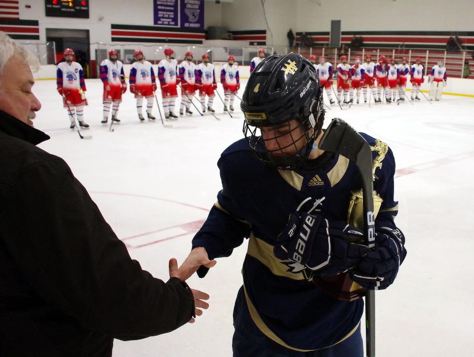 Archbishop Williams' Matt Deminico receives the tournament MVP trophy after the inaugural Christmas Classic final on Dec. 29, 2021. Archies beat Bridgewater-Raynham in the title game.