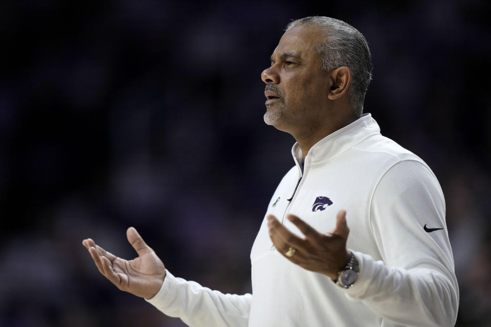 Kansas State head coach Jerome Tang questions a call during the first half of an NCAA college basketball game against TCU Saturday, Feb. 17, 2024, in Manhattan, Kan. (AP Photo/Charlie Riedel)