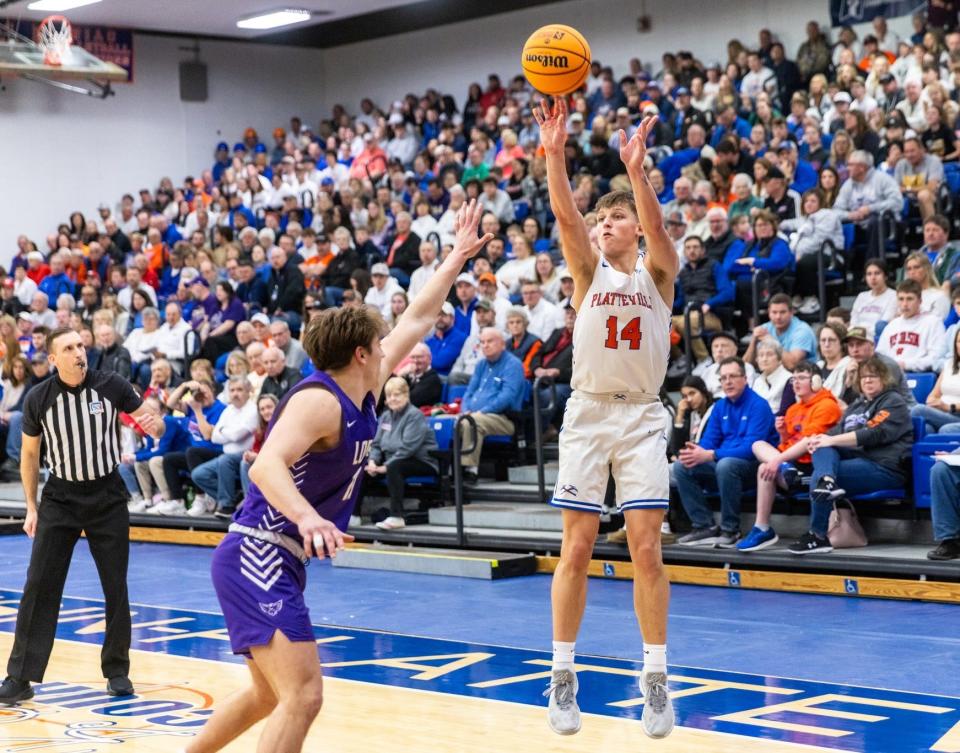 Former Kimberly standout Logan Pearson, right, was chosen the National Association of Basketball Coaches Division III player of the year.