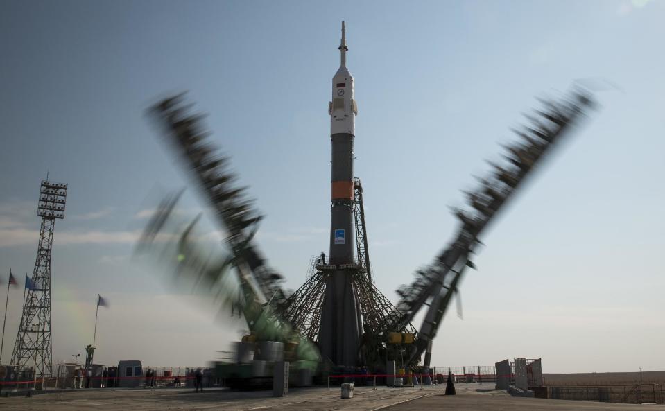 The gantry arms of the Soyuz rocket are seen closing in this long exposure photograph at the Baikonur Cosmodrome, Kazakhstan, Sunday, Sept. 10, 2017: Bill Ingalls/NASA via Getty Images