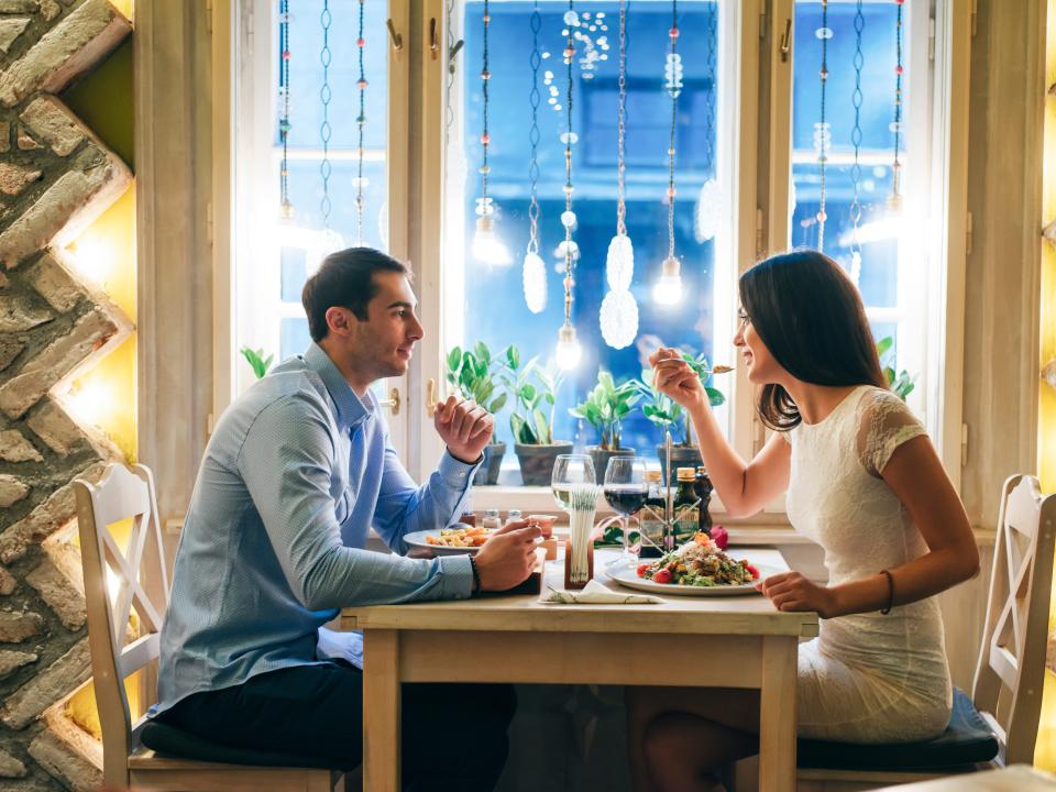 Couple having dinner in a restaurant.