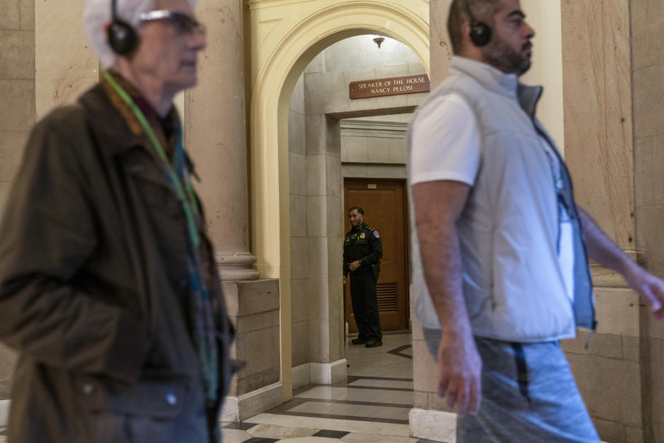 Tourists walk past House Speaker Nancy Pelosi's office, Friday, Oct. 28, 2022, on Capitol Hill in Washington. (AP Photo/Jacquelyn Martin)
