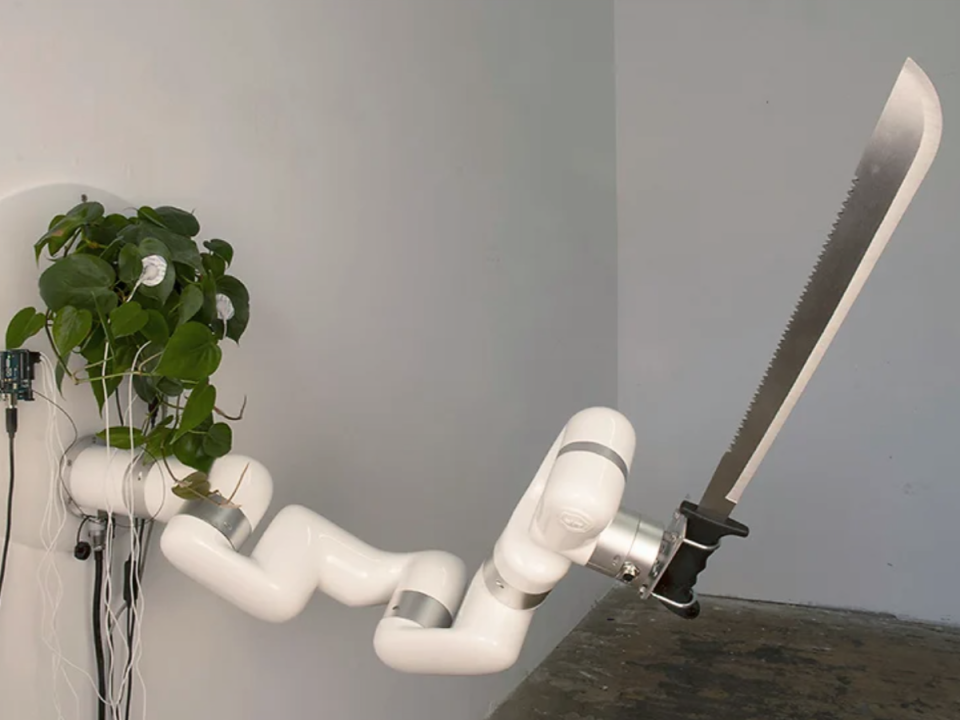 A living plant acting as a ‘brain’ to a robotic arm wielded a machete as part of an installation called ‘Plant Machete' (David Bowen/ Vimeo/ Screenshot)