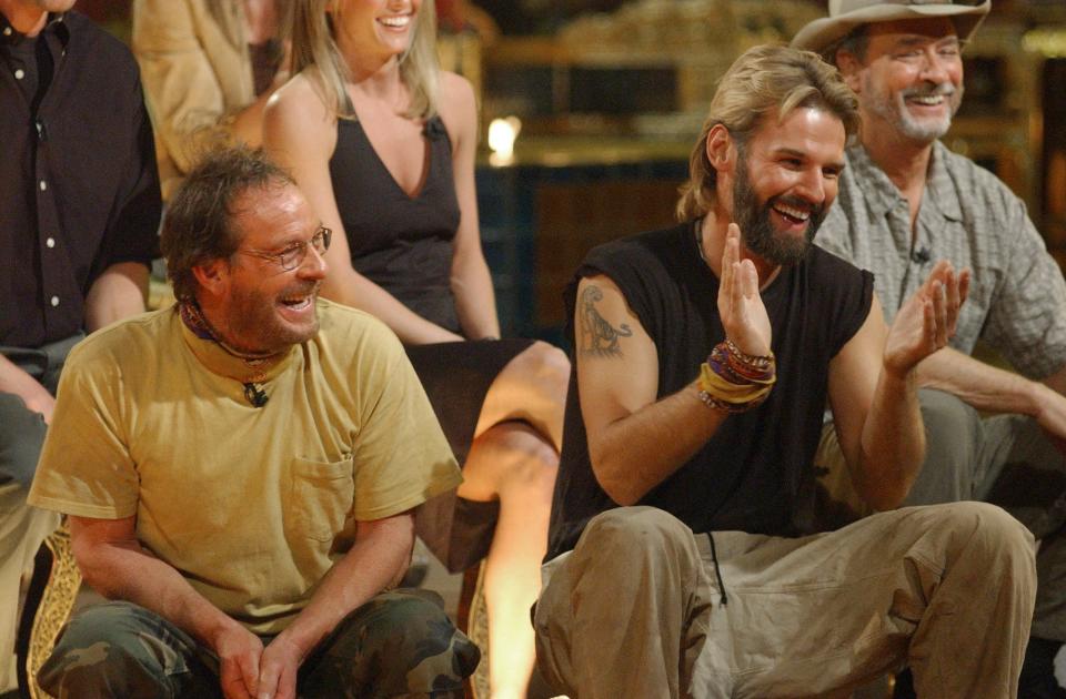 "Survivor: Thailand," runner-up Clay Jordan, left, of Monroe, shares a laugh with winner Brian Heidik, right, during the conclusion of "Survivor: Thailand," Dec. 19, 2002, in Los Angeles. Jordan died Thursday.