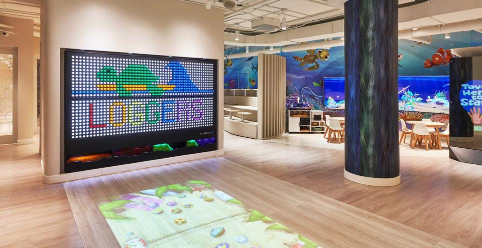 Eau Palm Beach Resort's new children's club center includes a light board with 1,300 colored pegs to rearrange and make images.
