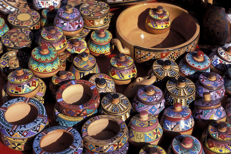 best christmas markets around the world, PERU - 1998/01/01: Peru, Near Cuzco, Sacred Valley, Pisaq, Market, Pottery For Sale. (Photo by Wolfgang Kaehler/LightRocket via Getty Images)