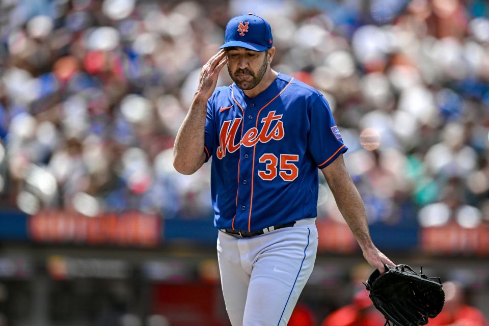New York Mets starting pitcher Justin Verlander (35) walks to the dugout during the fourth inning against the Washington Nationals on July 30, 2023, at Citi Field.