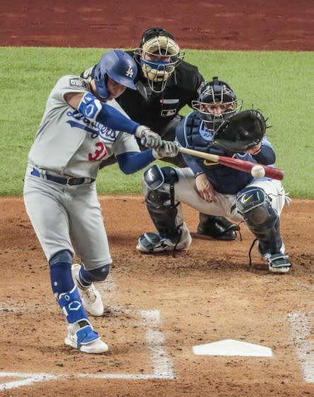 Dodgers outfielder Joc Pederson hits a home run against the Tampa Bay Rays during Game 5 of the World Series.