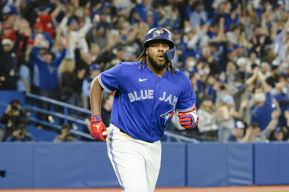 Toronto Blue Jays' Vladimir Guerrero Jr. runs bases after hitting a home run against the Houston Astros during the third inning of a baseball game Friday, April 29, 2022, in Toronto. (Christopher Katsarov/The Canadian Press via AP)