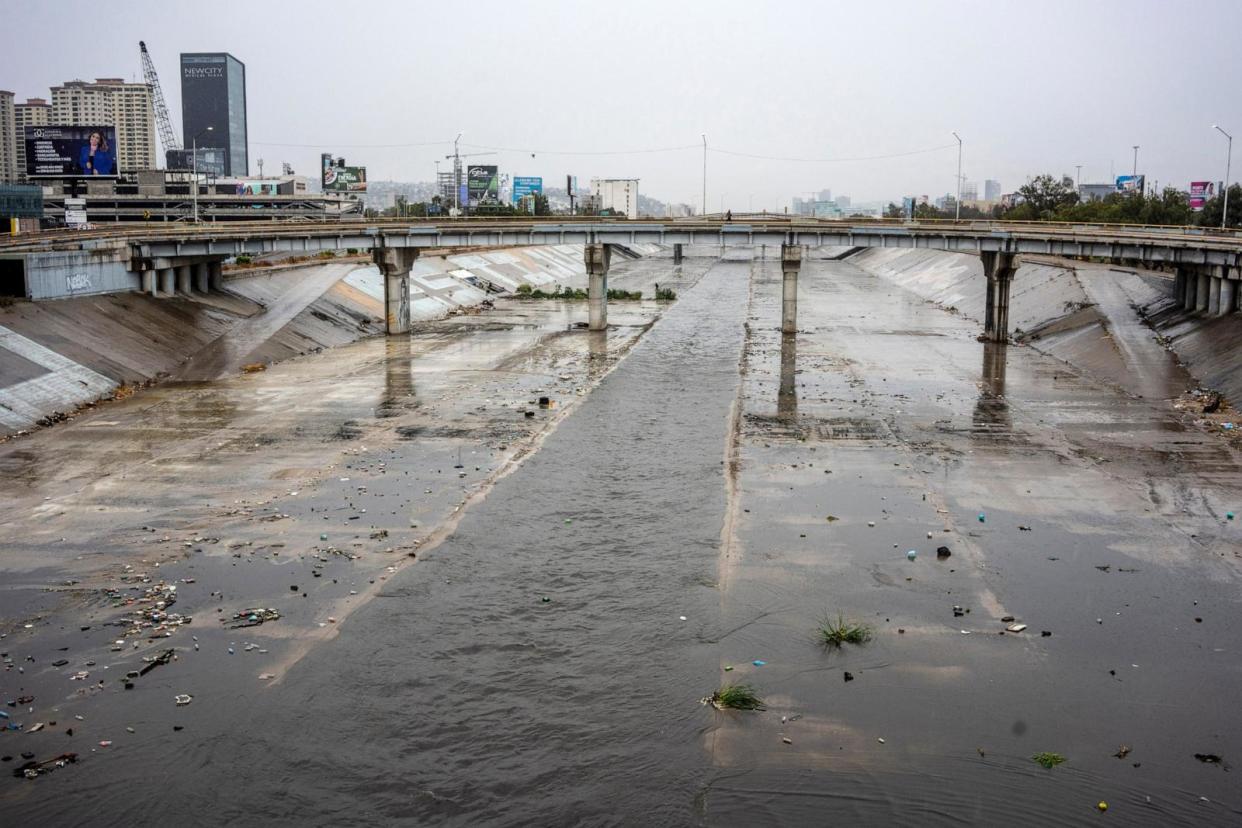 PHOTO: The Tijuana River flows ahead of Tropical Storm Hilary's landfall in Tijuana, Mexico, Aug. 20, 2023. (Cesar Rodriguez/Bloomberg via Getty Images)