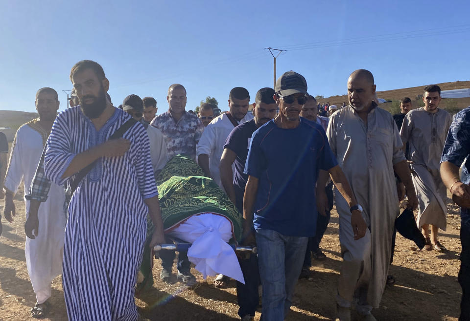 People attend the funeral of Bilal Kissi, who was killed by Algerian forces, in the city of Saaidia, Morocco, Thursday, Aug. 31, 2023. Two men were killed by Algerian forces after they strayed across Morocco’s maritime border with Algeria on water scooters, and a third was detained by Algerian authorities, according to Moroccan media reports.(AP Photo)