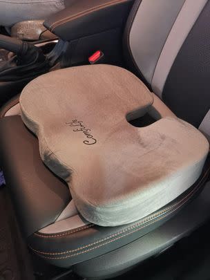 An ergonomic memory foam seat cushion