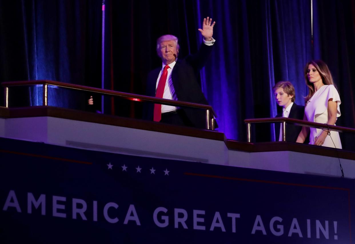 President-elect Donald Trump, with son Barron and wife, Melania, acknowledges his supporters on election night in New York City, Nov. 9, 2016. (Photo: Chip Somodevilla/Getty Images)