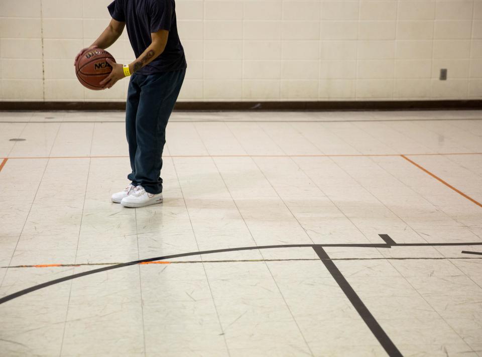 Juveniles play a game of basketball at the Juvenile Detention Center, Friday, Aug. 2. During the summer, juveniles are allowed one hour of recreational time in the morning and one hour of recreational time in the evening.