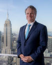 Brian Moynihan, CEO of Bank of America, is photographed at the Bank of America Tower, Wednesday, Aug. 17, 2022, in the Manhattan borough of New York. Moynihan, said that recent quibbling over whether the U.S. economy is technically in a recession or not is missing the point. What matters is that current economic conditions are negatively impacting those who are most vulnerable.(AP Photo/John Minchillo)