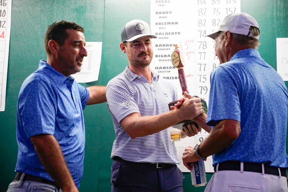 Rick Lamb is congratulated after winning the 61st Yuengling Open at the Fort Myers Country Club in Fort Myers on Sunday, March 5, 2023.
