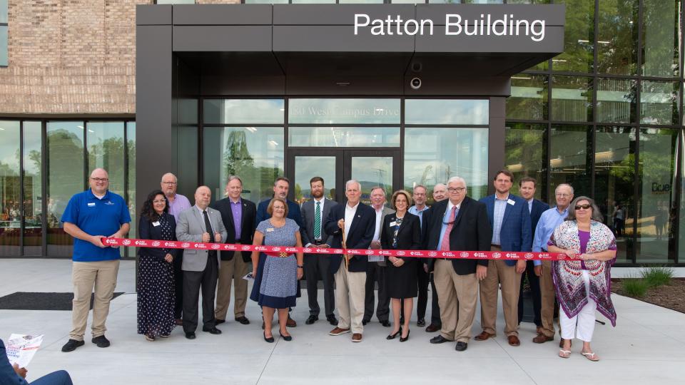Several hundred community members gathered for the grand opening and ribbon cutting of the Patton Building on Tuesday, July 12.