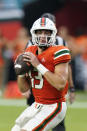 Miami quarterback Jake Garcia (13) drops back to pass during the second half of an NCAA college football game against Middle Tennessee, Saturday, Sept. 24, 2022, in Miami Gardens, Fla. (AP Photo/Wilfredo Lee)