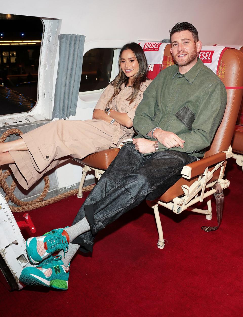 <p>Jamie Chung and Bryan Greenberg sit back and relax at the Diesel event at the TWA Hotel on June 24 in N.Y.C. </p>