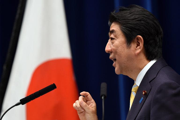 Japan's Prime Minister Shinzo Abe speaks during a press conference in Tokyo, on May 14, 2015