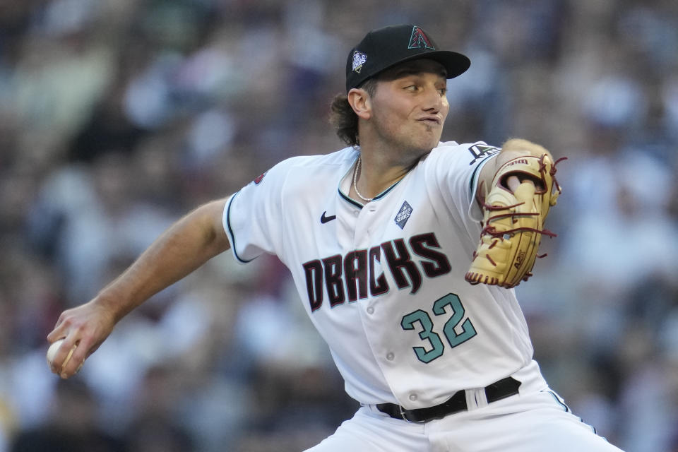 Arizona Diamondbacks starting pitcher Brandon Pfaadt throws against the Texas Rangers during the first inning in Game 3 of the baseball World Series Monday, Oct. 30, 2023, in Phoenix. (AP Photo/Godofredo A. Vásquez)